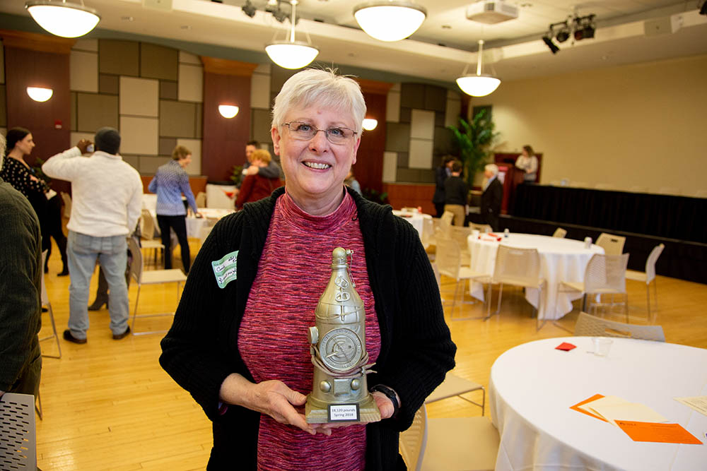 Neighborhood Association representative Cincy Britton accepts the I.D.E.A. Conference Cleanup Award on behalf of the Old West End Neighborhood. Photo provided