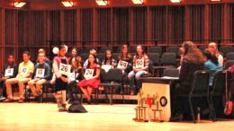 Burris Laboratory School student Alesya Rathinasamy spells a word in front of the judges at the 2018 WIPB Spelling Bee. Photo provided