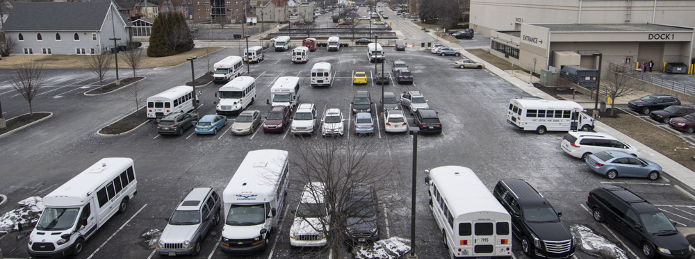 White school system shuttle buses arriving at the Horizon Convention Center. Photo by: Mike Rhodes