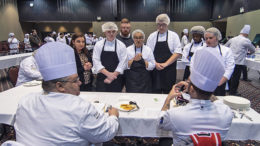 Chef judges provide feedback to students about their entry during the culinary STAR event. Photo by: Mike Rhodes