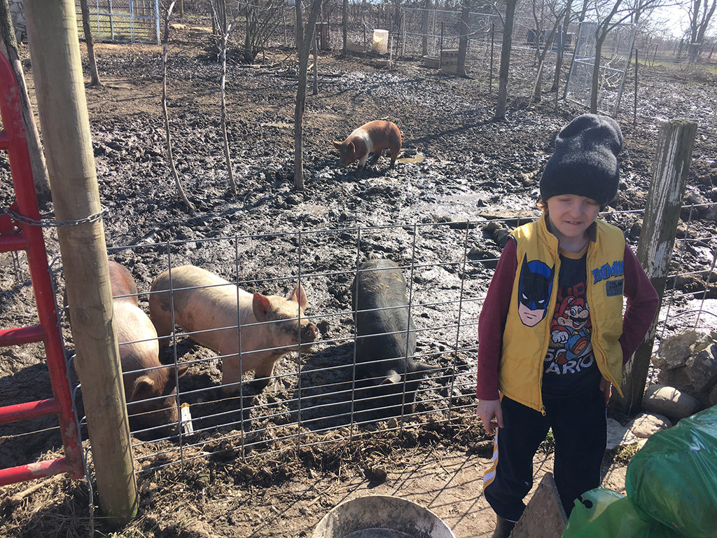 Aaron Hunter out in his happy place, the barnyard. Photo provided