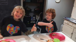 Aaron Hunter (right) interacts with his younger brother, Zachary. Photo provided