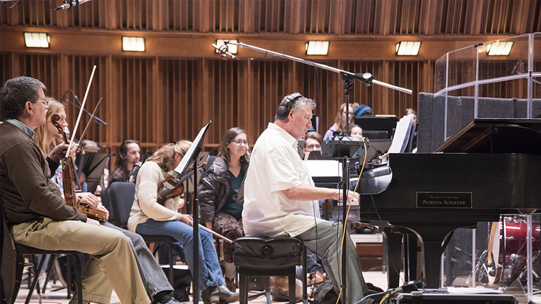 Michael Rafter is pictured playing the grand piano. Photo provided