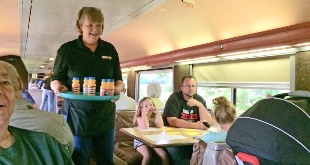 Attendants on the Nickel Plate Express work in the dining car. Photo by: Nancy Carlson