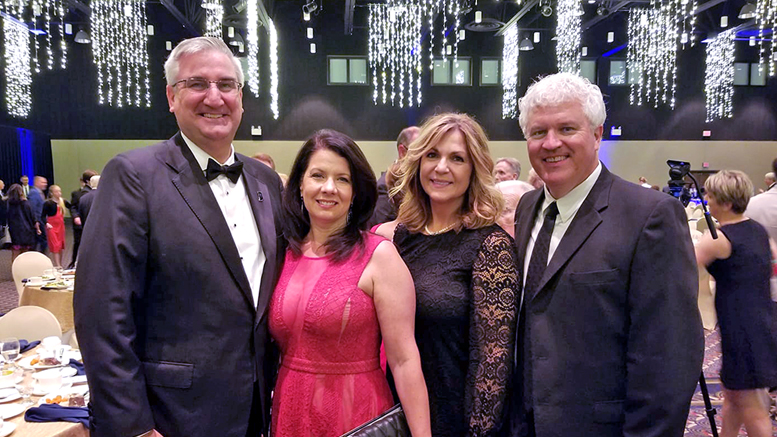 Pictured from L-R: Indiana Governor Eric Holcomb, Indiana First Lady Janet Holcomb, Nancy Larson-Lindell, and Steve Lindell, Master of Ceremonies for the event. Photo by: Ben Polk