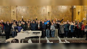 Participants of Masterworks Chorale’s 2018 Music That Makes Community Workshop celebrate together after a day of learning chorale techniques. Photo provided