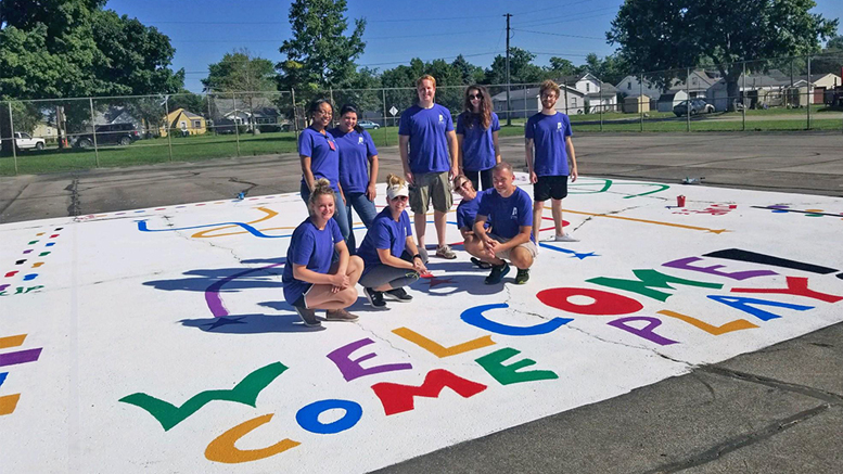 IU Health Ball Memorial Hospital team members are pictured painting at Thomas Park during the 2018 "Day of Service." Photo provided