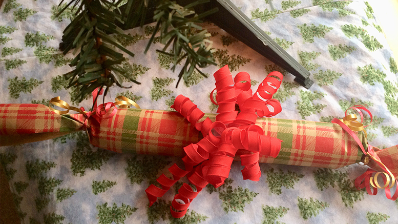 Just guess what’s under all this wrapping paper! Photo by: Nancy Carlson