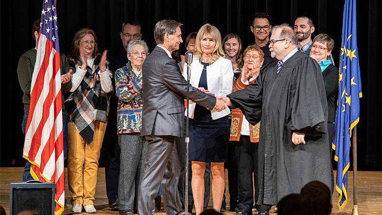 Dan Ridenour is pictured immediately after being sworn in by John Feick, Delaware County Circuit Court 4 Judge in ceremonies held at Muncie Central HS on Dec. 28th. Photo by: Mike Rhodes