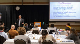 Jim Higgins is pictured during his presentation on local finance. Photo by: Mike Rhodes