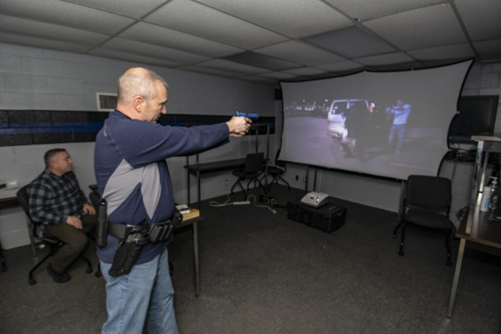 L-R: Lieutenant Andrew Payne leads a training session as Larry Bledsoe participates. Photo by: Mike Rhodes