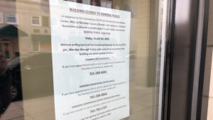 Sign of the times. Affixed to the front door of the Horizon Convention Center. Photo by: Mike Rhodes