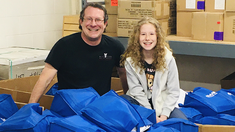 BSU Professor Darren Wheeler and EWA student Amy Wheeler provided COVID-19 relief as Back To School Teachers Store volunteers preparing 3,000 Remote Learning Supply Kits to all MCS elementary families for the May 4th distribution. Photo by: Stacy Wheeler.