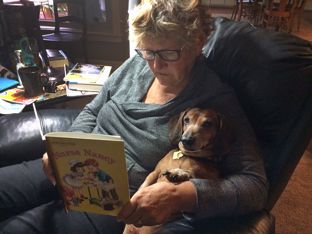 Toby’s favorite place to be was sitting alongside Nancy.