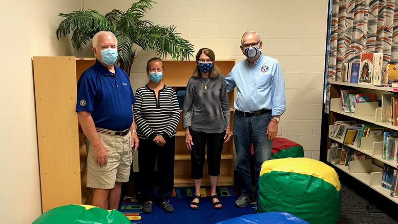 Tom Alexander, Gloria Adams, Felicia and David Dixon at Cowan Elementary School. Photo by Scott Metzler