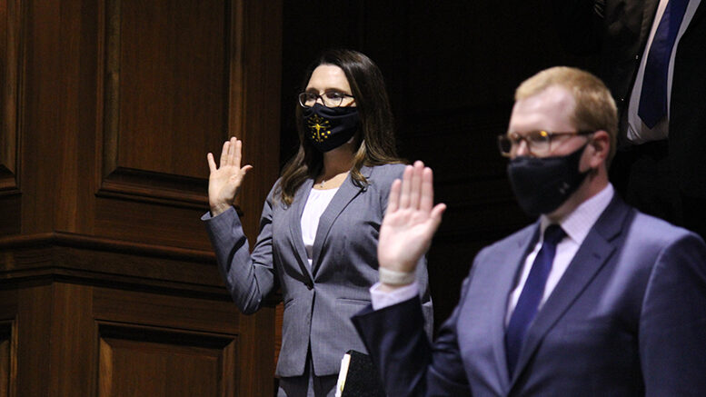 State Rep.-elect Elizabeth Rowray (R-Yorktown) (left) takes the oath of office during Organization Day Tuesday, Nov. 17, 2020, at the Statehouse. Rowray will serve House District 35 in the General Assembly, which includes portions of Delaware and Madison counties.