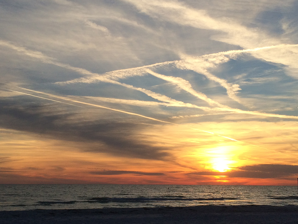 Nothing is as beautiful as the sun setting behind a glorious body of water. Photo by Nancy Carlson