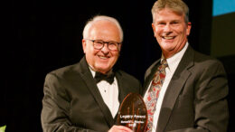 (L): Reverend Dr. Ronald Naylor is pictured receiving the award with (R): Terry Pence, Vice President of Operations for IU Health Ball Memorial Hospital and Chairman of the Muncie-Delaware County Chamber of Commerce Board of Directors. Photo by Matt Howell