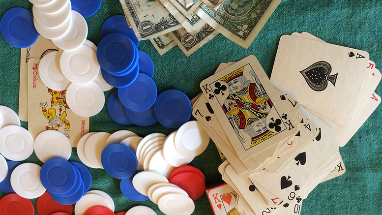 Can money, cards and poker chips spell trouble for some? You bet. Photo by Nancy Carlson.
