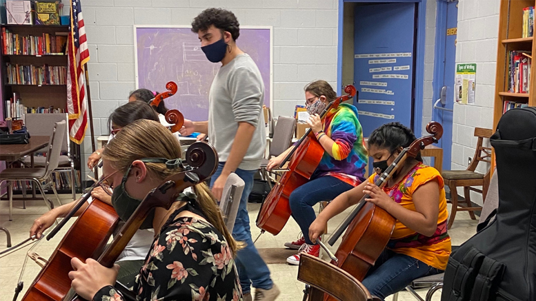 The Ross Community Center, which was awarded operational funding from The Community Foundation, provides innovative youth and adult programming to enhance lifelong learning, like orchestra instruction (pictured), along with community services, including a weekly community market.