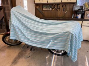 Under a bedsheet is no place for a beloved motorcycle. Photo by Nancy Carlson