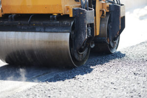 Working on asphalting a local road.