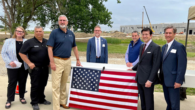 Pictured Left to right: Traci Lutton, Vice President of Muncie-Delaware County Economic Development Alliance; James King, Delaware County Commissioner; Indiana Gov. Eric Holcomb; Brad Bookout, Director of Economic & Municipal Affairs; Tom Johnson, Regional Manager of CANPACK-US; Peter Giorgi, President and CEO of Giorgi Global Holdings, Inc.; Mayor Dan Ridenour, City of Muncie. Photo by Tylonius Studio, Inc.