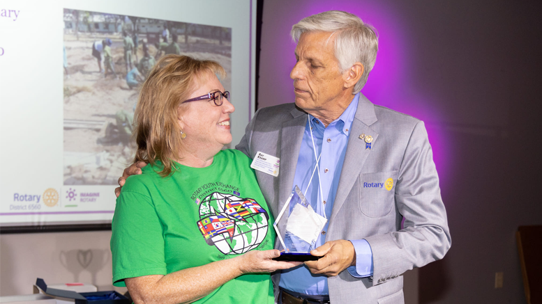 Immediate Past-District Governor Ray Kramp is pictured presenting McKinney with the award. Photo provided