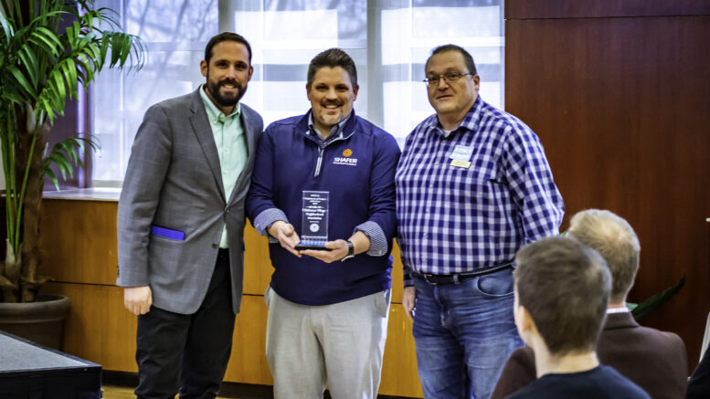 Accepting the Neighborhood Project of the Year Award at the 2022 I.D.E.A. Conference: J.P. Hall, President - Halteman Village Neighborhood Association, Mitch Isaacs, Executive Director - Shafer Leadership Academy, and Brad Polk, Vice President - Halteman Village Neighborhood Association. Photo provided