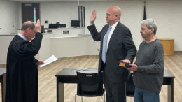 Thomas A. Cannon Jr., Judge of the Delaware Circuit Court No. 5 is pictured administering the Oath of Office to Eric Hoffman. Eric’s father, Charles Hoffman is holding the bible during the swearing-in ceremony. Photo provided
