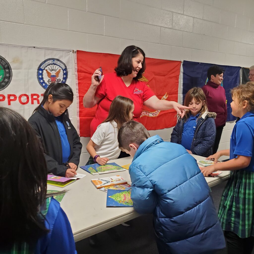 Angela Beck helping a student.