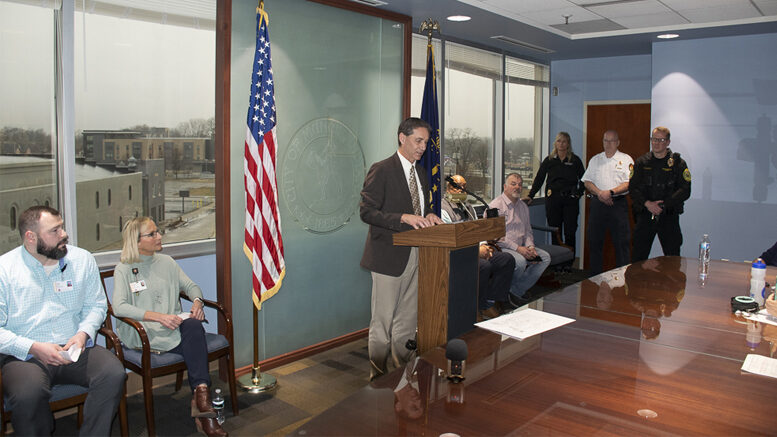 Mayor Ridenour and representatives from IU Health Ball Memorial Hospital and local law enforcement are pictured during the announcement of "The Muncie Crisis Center." Photo by Mike Rhodes