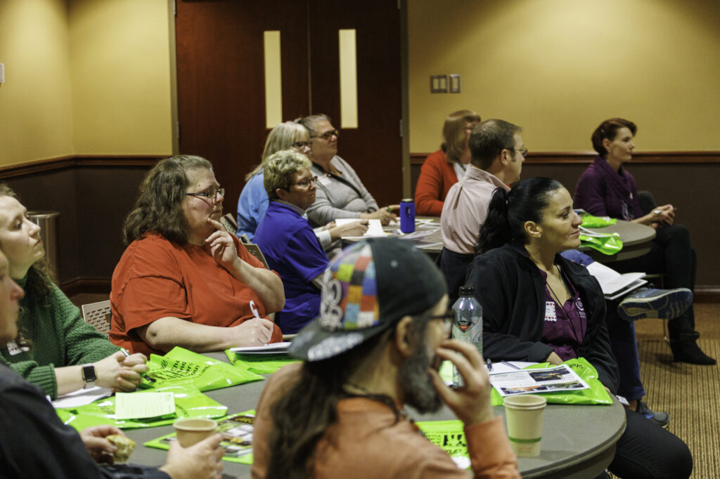 Attendees listen to a presentation during the IDEA conference breakout session portion of the program. Photo provided