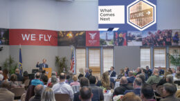 Muncie Mayor Dan Ridenour is pictured giving his 3rd annual State of the City report at the Ball State Alumni Center. His slide presentation appeared on numerous television monitors circling the meeting room. Photo by Mike Rhodes