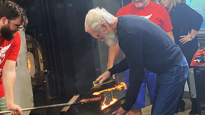 David Letterman is pictured working with students on a glass project. Photo provided by BSU.