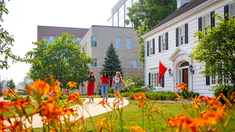 Students are pictured outside the familiar Edmund F. and Virginia B. Ball Honors College House. Photo provided