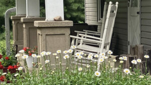 Flowers flourish at the front of a home on the Garden Walk. Photo provided