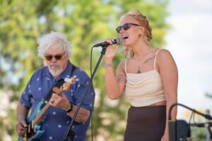 A singer performing at Canan Commons during ArtsWalk, one of many musical events in downtown Muncie. Photo provided