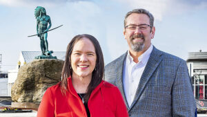 Community Foundation of Muncie and Delaware County President Marcy Minton and Ball Brothers Foundation President/CEO Jud Fisher pose for a photo in downtown Muncie.