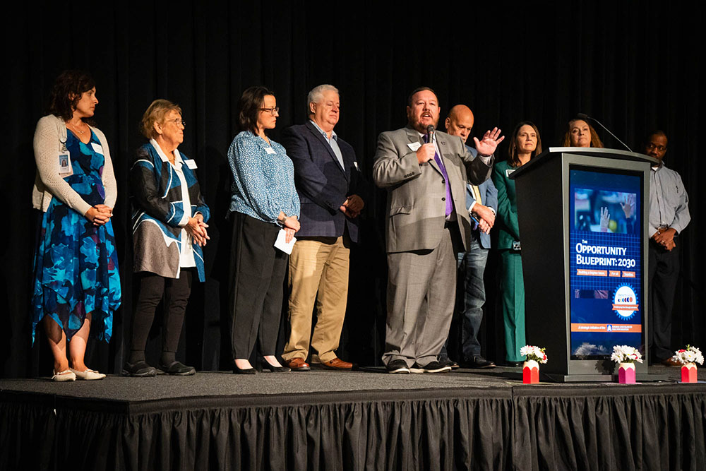 Muncie Central High School principal Chris Walker is pictured speaking at the Opportunity Blueprint event. Photo provided.