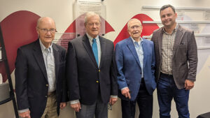Founding Committee members Steve Anderson, Tom Kinghorn, and Van Smith stand alongside Board Chair Casey Stanley at a special luncheon honoring the establishment of The Community Foundation of Muncie and Delaware County 40 years ago. Their early leadership and commitment to unrestricted giving laid the foundation for a community resource that continues to be relevant, responsive, and representative—today, tomorrow, and always.
