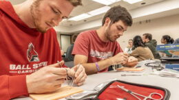 Ball State and IU students practice suturing techniques as part of regional healthcare training programs supported by Ball Brothers Foundation. New grants strengthen pathways from high school to healthcare careers throughout East Central Indiana.