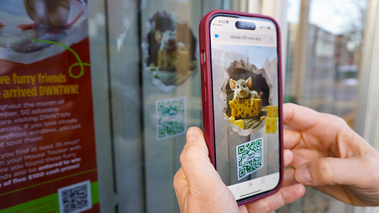 Participants will scan DWNTWN Wonder Hunt “Mousecapades” window decals to reveal an animated 3D mouse created in partnership with Ball State’s IDIA Lab. Fifty interactive mice are hidden throughout downtown storefronts for this year’s holiday Wonder Hunt adventure. Photo provided.