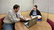 MPL employees Joe Nelson and Laura Janiga use the meeting space inside one of the new Zenbooth pods available for reservations at Kennedy Library. Photo by Spenser Querry, MPL Public Relations.
