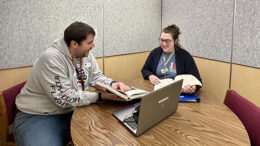 MPL employees Joe Nelson and Laura Janiga use the meeting space inside one of the new Zenbooth pods available for reservations at Kennedy Library. Photo by Spenser Querry, MPL Public Relations.