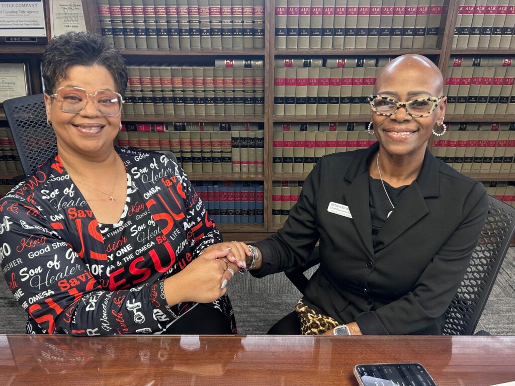 Curtisa Goodwin, Chief Executive Officer of the Muncie Housing Authority (left) and WaTasha Barnes Griffin, Chief Executive Officer of YWCA Central Indiana at the closing of the YWCA’s new building. Photo provided.