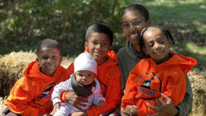 Megan Negasi with her children.