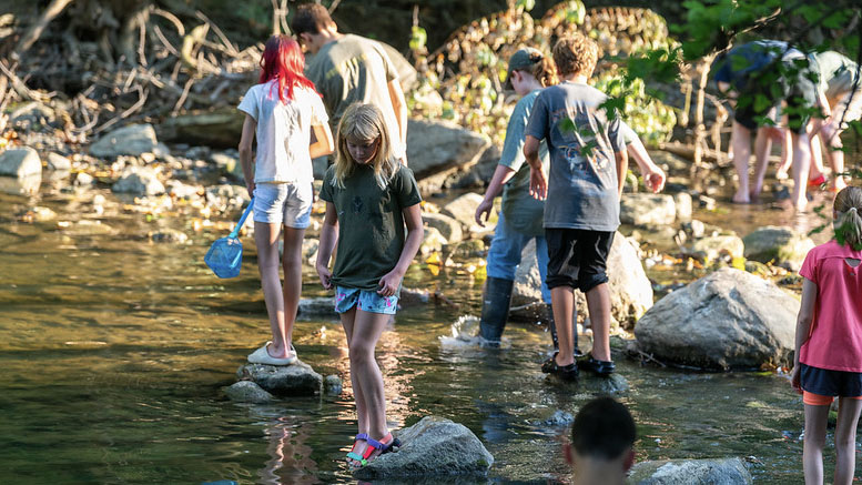 Children engage in Fish and Mussels Program through Red-tail Land Conservancy. Photo provided by Red-tail Land Conservancy.