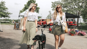 Torie Foerster and Liz Yates are pictured attending a past Farmers Market at Minnetrista with their dog. Photo provided.
