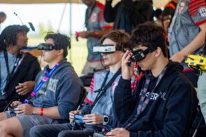 Drone pilots are pictured with their vision systems designed to assist in flying their drones. Photo provided.